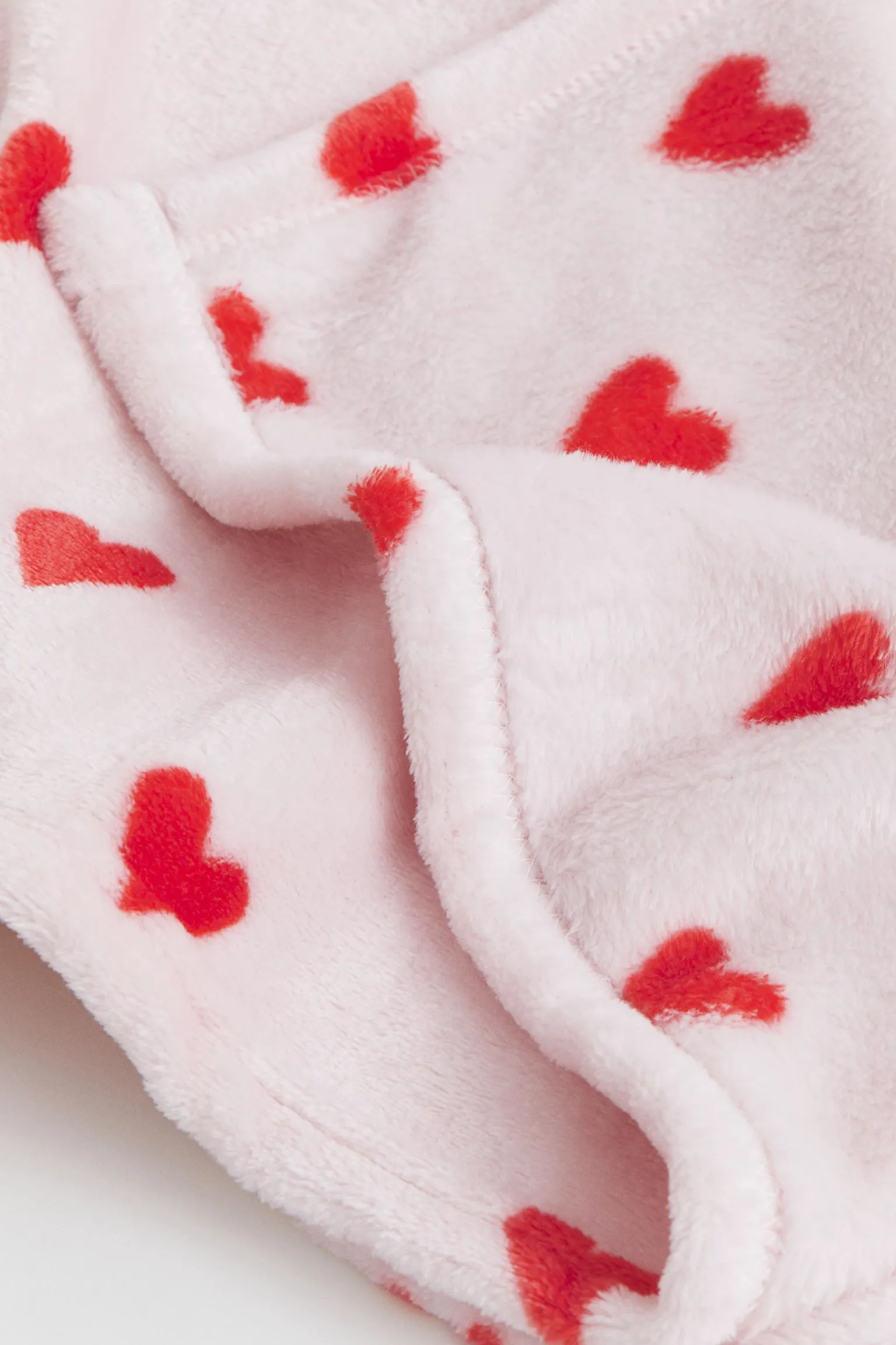 H&M Home Patterned Fleece Hearts Blanket, light pink/red